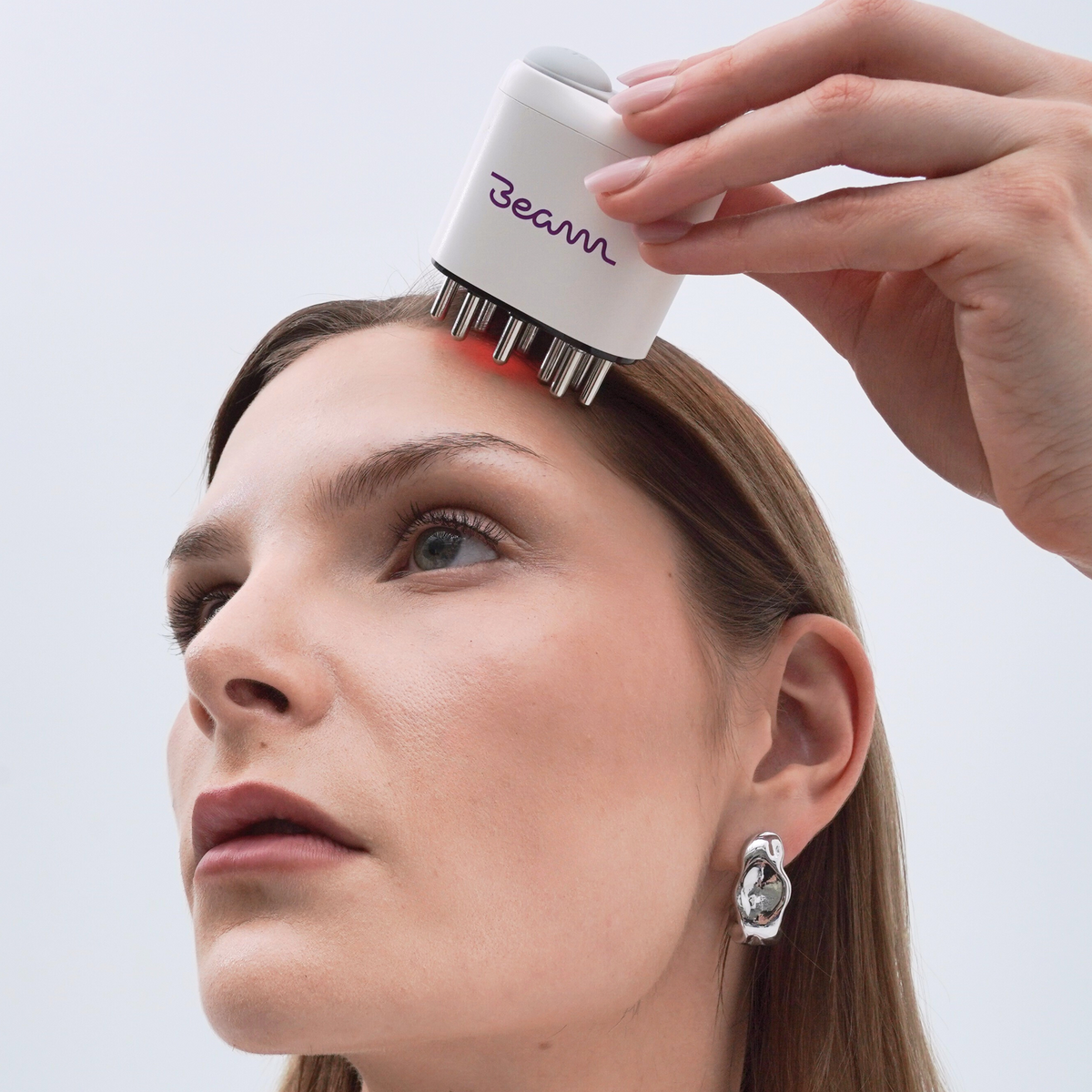 Beam Scalp being gently applied to the scalp